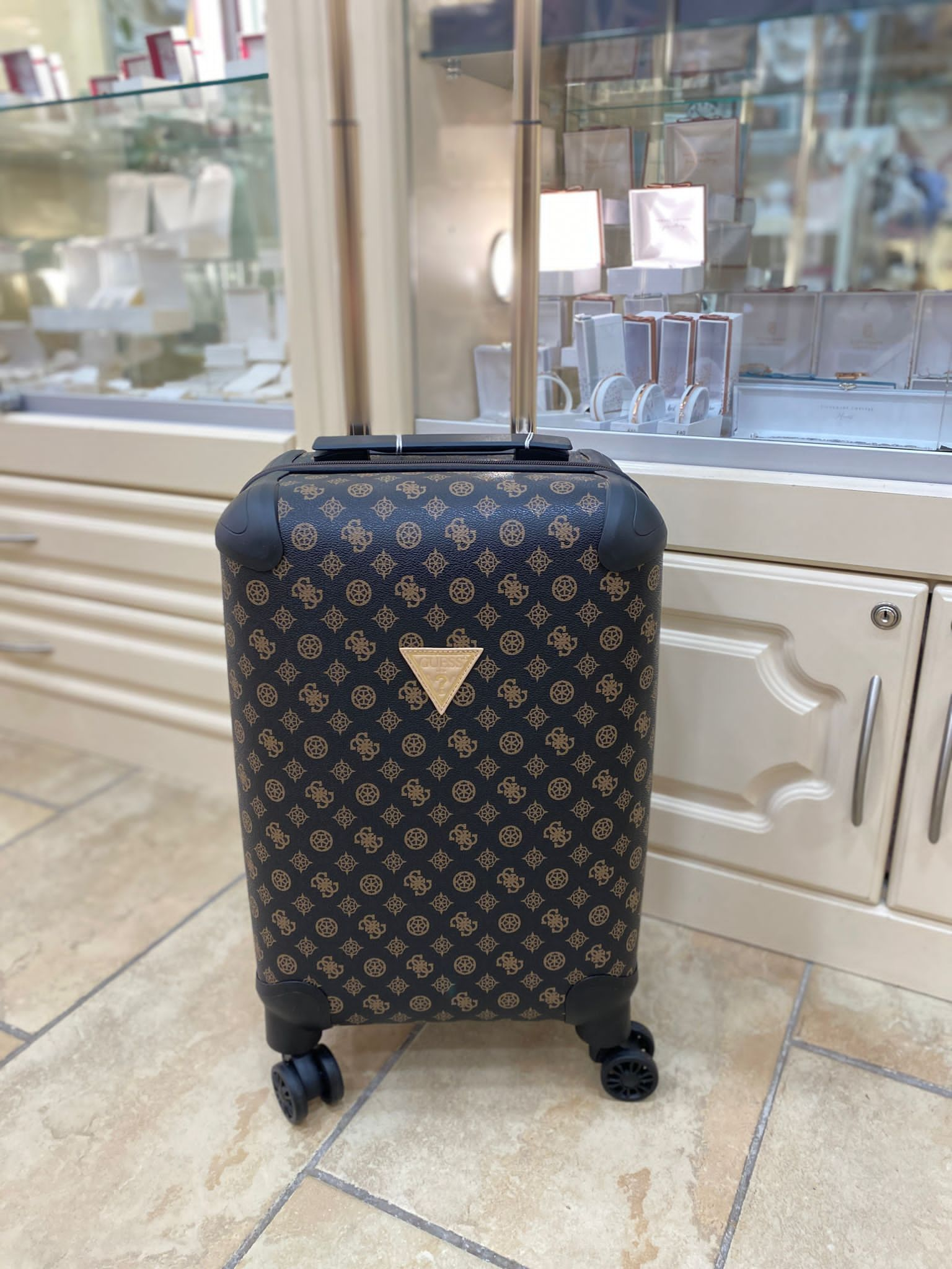 Guess suitcases discount